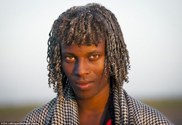 An Ethiopian man with ghee in his hair