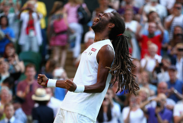 LONDON, ENGLAND - JULY 02:  Dustin Brown of Germany celebrates winning his Gentlemens Singles Second Round match against Rafael Nadal of Spain during day four of the Wimbledon Lawn Tennis Championships at the All England Lawn Tennis and Croquet Club on July 2, 2015 in London, England.  (Photo by Ian Walton/Getty Images)