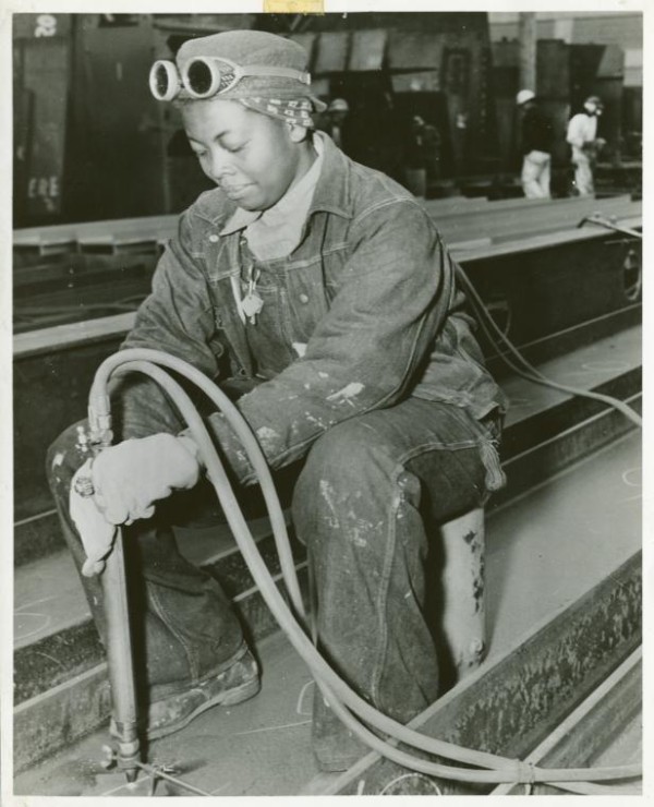 Anna Bland, a burner, is shown at work on the SS George Washington Carver as it was being rushed to completion in the spring of 1943. Source