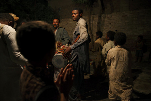 Sheedi men play music and dance during a celebration. Music and dance is one of the strongest African traits that remains in all Sheedi communities. Hyderabad, Pakistan