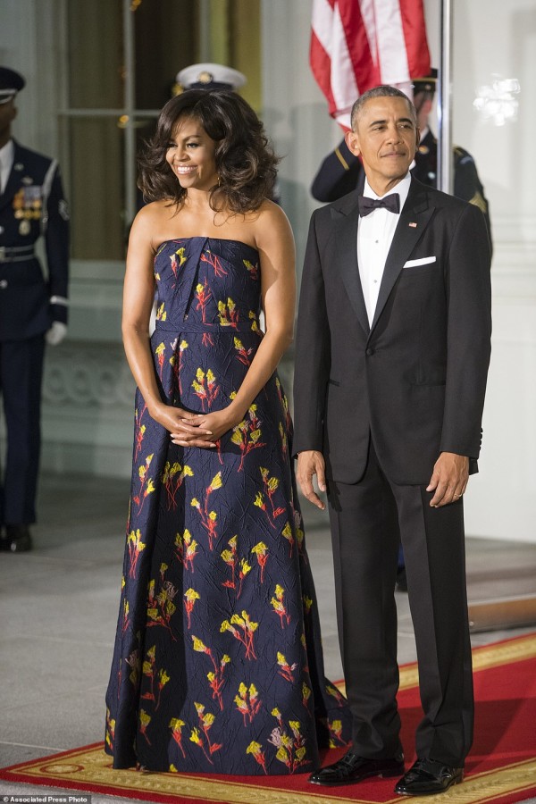President Barack Obama and first lady Michelle Obama wait to greet Canadian Prime Minister Justin Trudeau and Sophie Grégoire Trudeau at the North Portico of the White House in Washington, Thursday, March 10, 2016, for a state dinner. (AP Photo/J. Scott Applewhite)