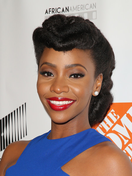 Honoree Teyonah Parris arrives at the 7th Annual AAFCA Awards on February 10, 2016 in Los Angeles, California. (Feb. 9, 2016 - Source: Imeh Akpanudosen/Getty Images North America) 